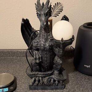 Mystical Dragon Figurine with Glowing Orb